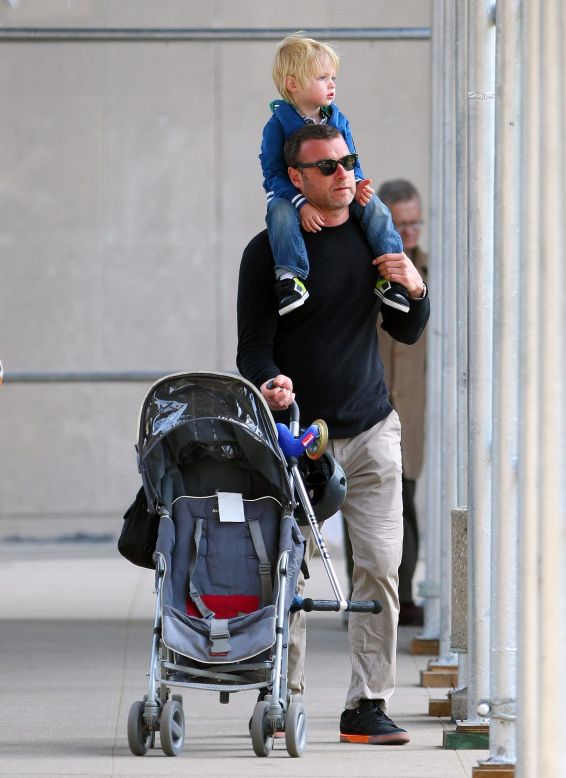 Liev Schreiber goes to the park with his children in New York City.