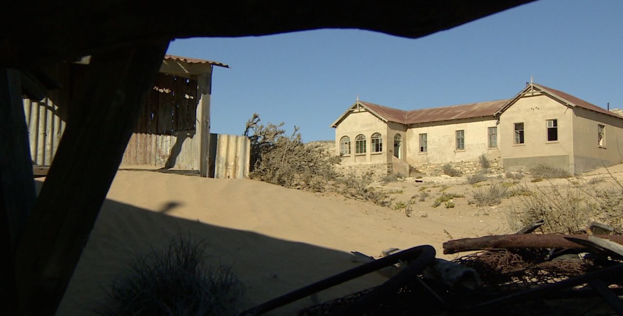 Diamonds were found in less extreme conditions further south, and the population began to drift away. The last residents left in the 1950s, leaving the town to be reclaimed by the desert sands.