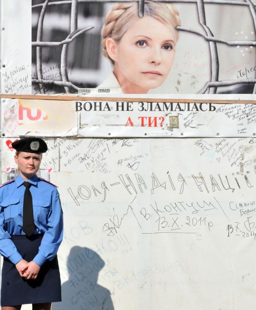 A police guard stands outside Tymoshenko's cell at the Kachanivska prison in Kharkiv. Her supporters have called on president Victor Yanukovych to quit in the wake of allegations of abuse.