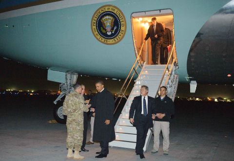Obama greets U.S. Lt. Gen. Curtis Scaparrotti and U.S. Ambassador to Afghanistan Ryan Crocker at Bagram, some 50 kilometers north of Kabul, Afghanistan. 