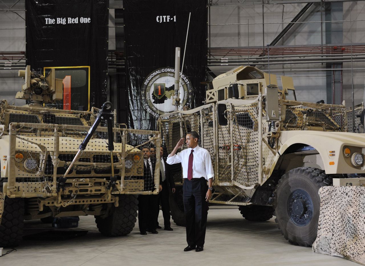 Obama salutes troops at Bagram Air Base in Afghanistan.  