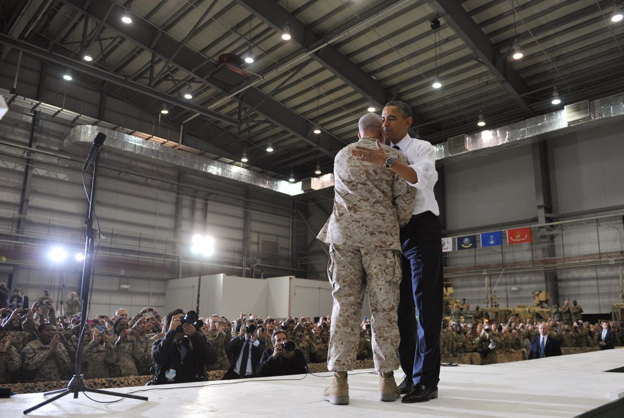 Obama greets Gen. John Allen, the top U.S. commander in Afghanistan, before addressing troops at Bagram Air Base.