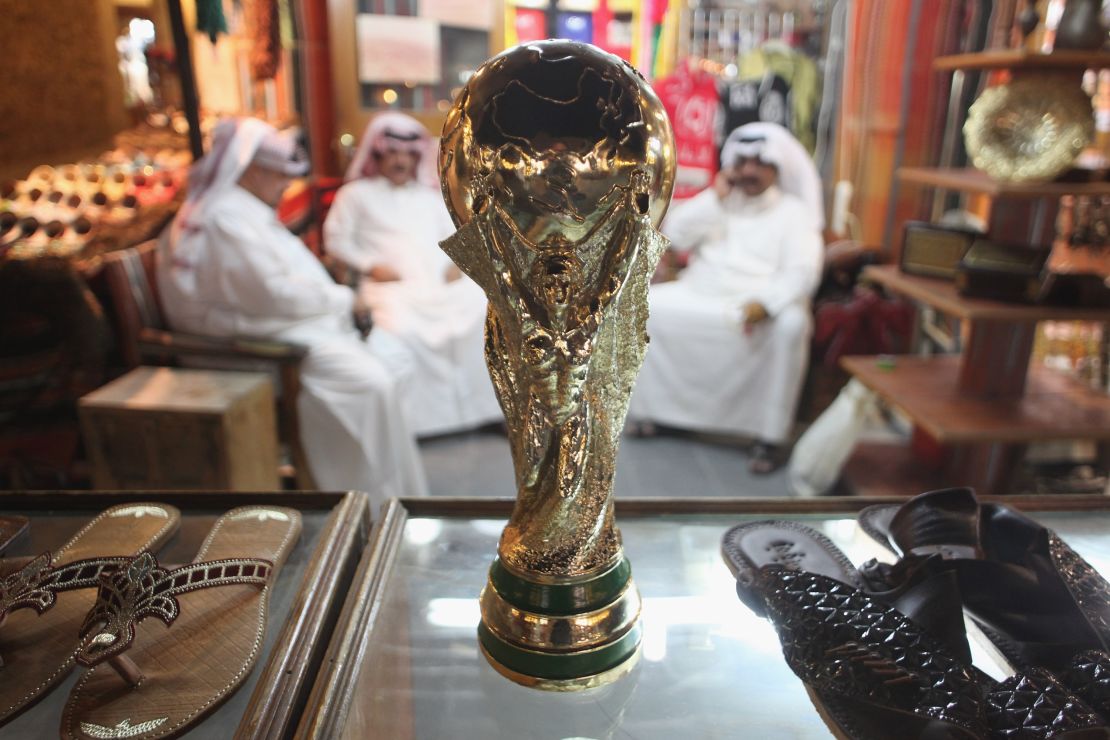 A replica World Cup in a shoemaker's stall in Souq Waqif traditional market in Doha.