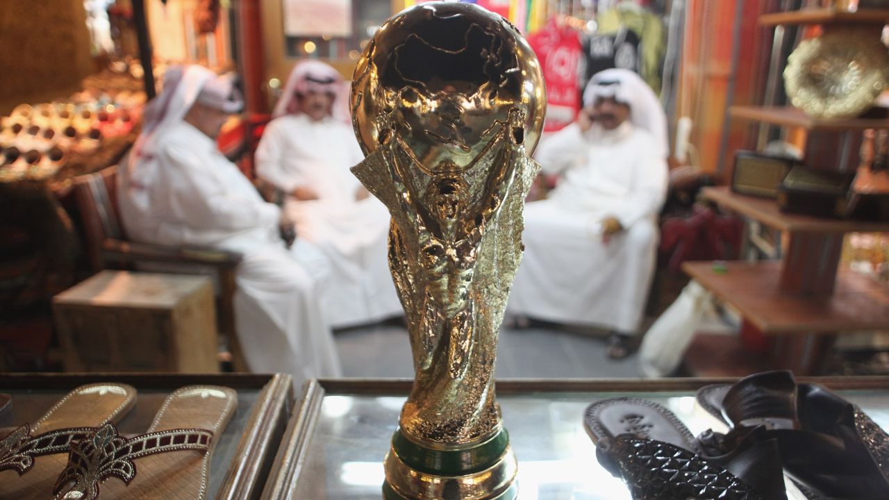A replica World Cup in a shoemaker's stall in Souq Waqif traditional market in Doha.
