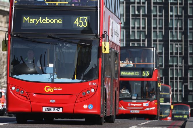 Double-decker buses make their way over Westminster Bridge in London in March. The iconic buses have been a wedge issue between the city's top contenders for mayor, incumbent Mayor Boris Johnson, the Conservative Party candidate, and Labour candidate Ken Livingstone, a former mayor. Both men have devoted their energies to transport -- and attacking each other on the issue.