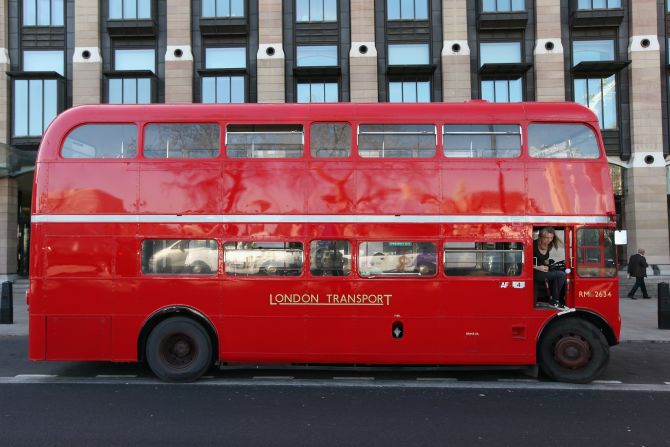 A classic Routemaster double-decker bus travels a route in Westminster in March.