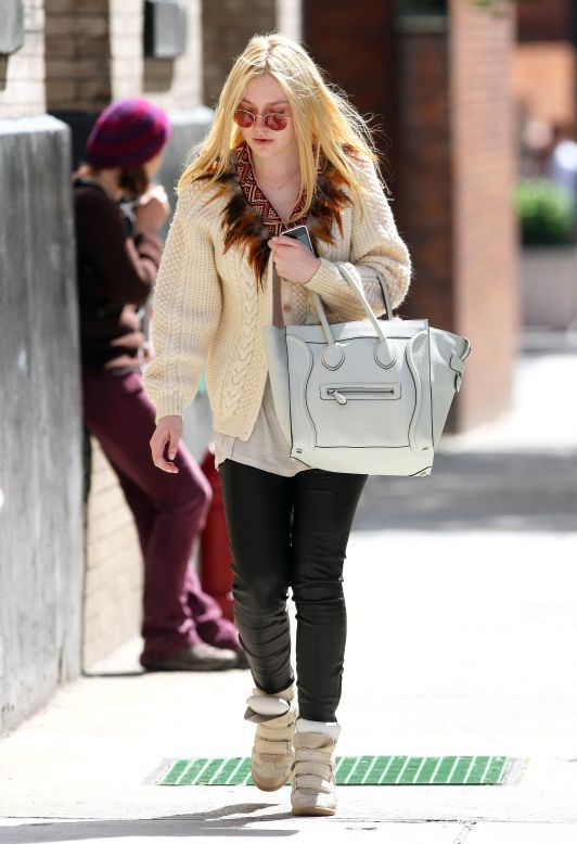 Dakota Fanning goes to class in New York City.