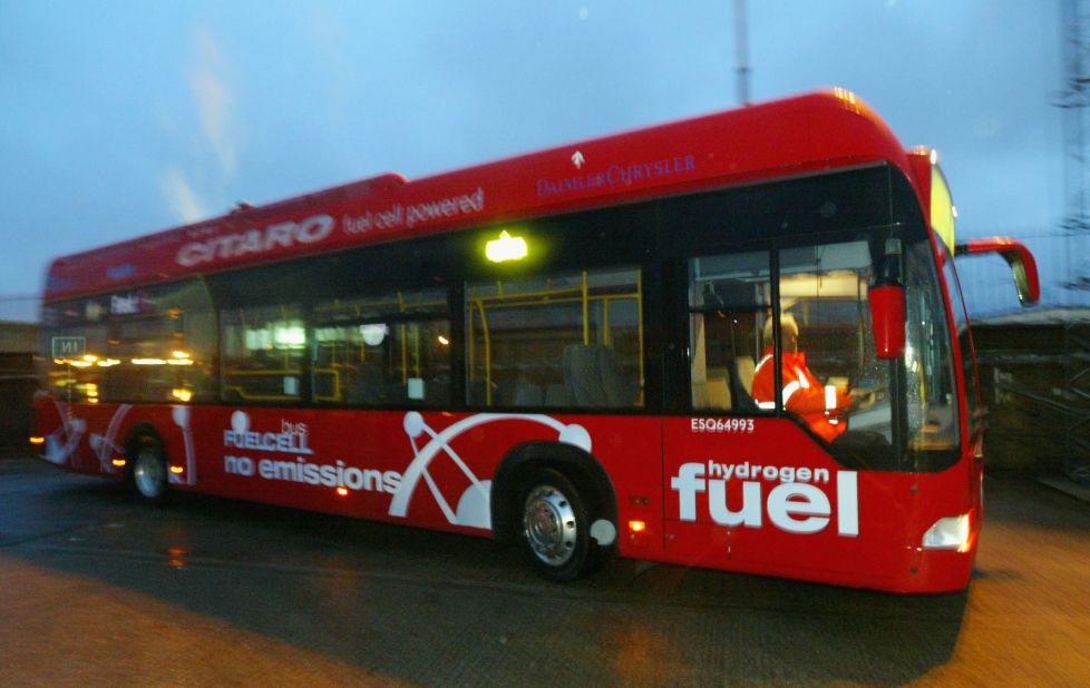 A  hydrogen-powered bus is refuelled at a depot in London in 2004.