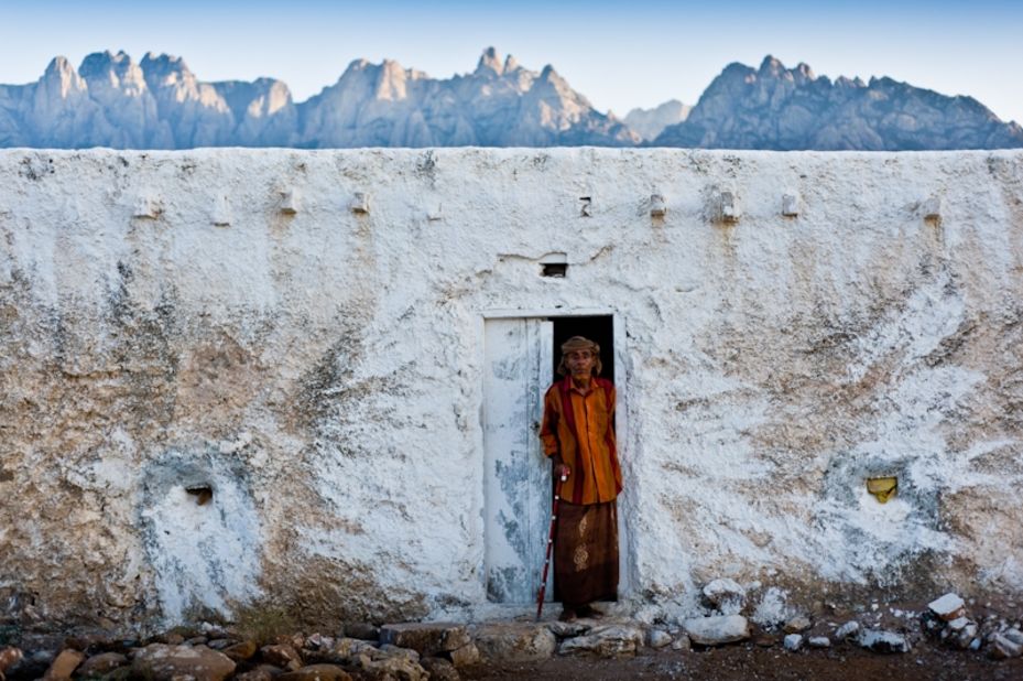 Tribal leader Sheikh al-Ghaddafi in front of his house in Socotra. The tribal Bedouin people of Socotra live mostly from goat herding, date plantations and fishing. 