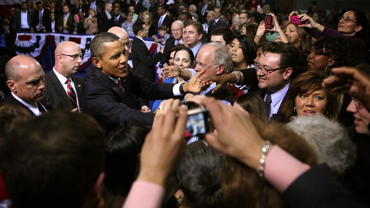 President Barack Obama shakes hands after delivering a speech on the economy in February in Falls Church, Virginia.