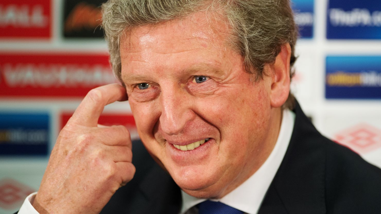 Roy Hodgson has been forced to apologize after divulging details about his England squad on the London underground