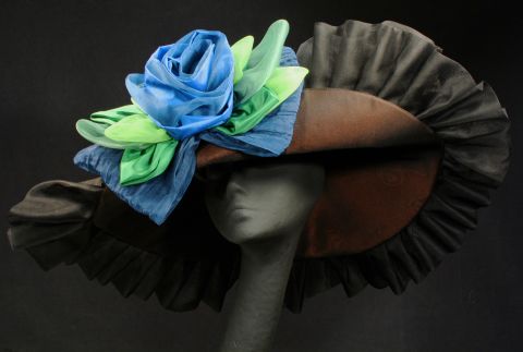 You may not be able to spot every single hat at the Derby, but four milliners shared their custom designs with us. Sally Faith Steinmann of<a href="http://www.maggiemae.com/" target="_blank" target="_blank"> Maggie Mae Designs</a> created this hat in honor of Arson Squad, a retired race horse, who belongs to the <a href="http://www.oldfriendsequine.org/" target="_blank" target="_blank">Old Friends of Kentucky</a>, a facility for retired thoroughbreds. The hat was auctioned to raise money and awareness for the foundation. Steinmann's love of horses inspires her designs. 