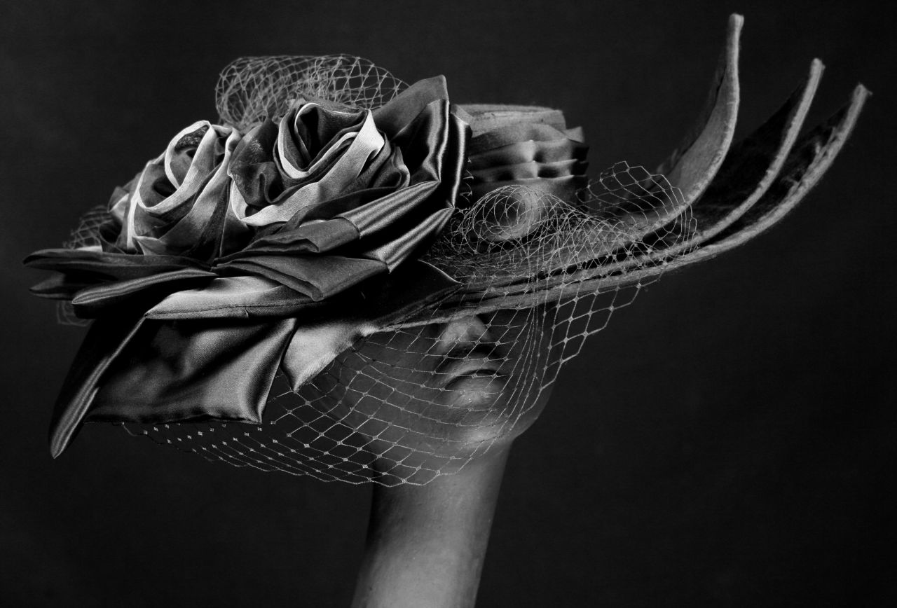 Vintage netting, featured on designs like Steinmann's "Marguerite" hat, is still a favorite among the Derby crowd, as is her use of pleated satin.