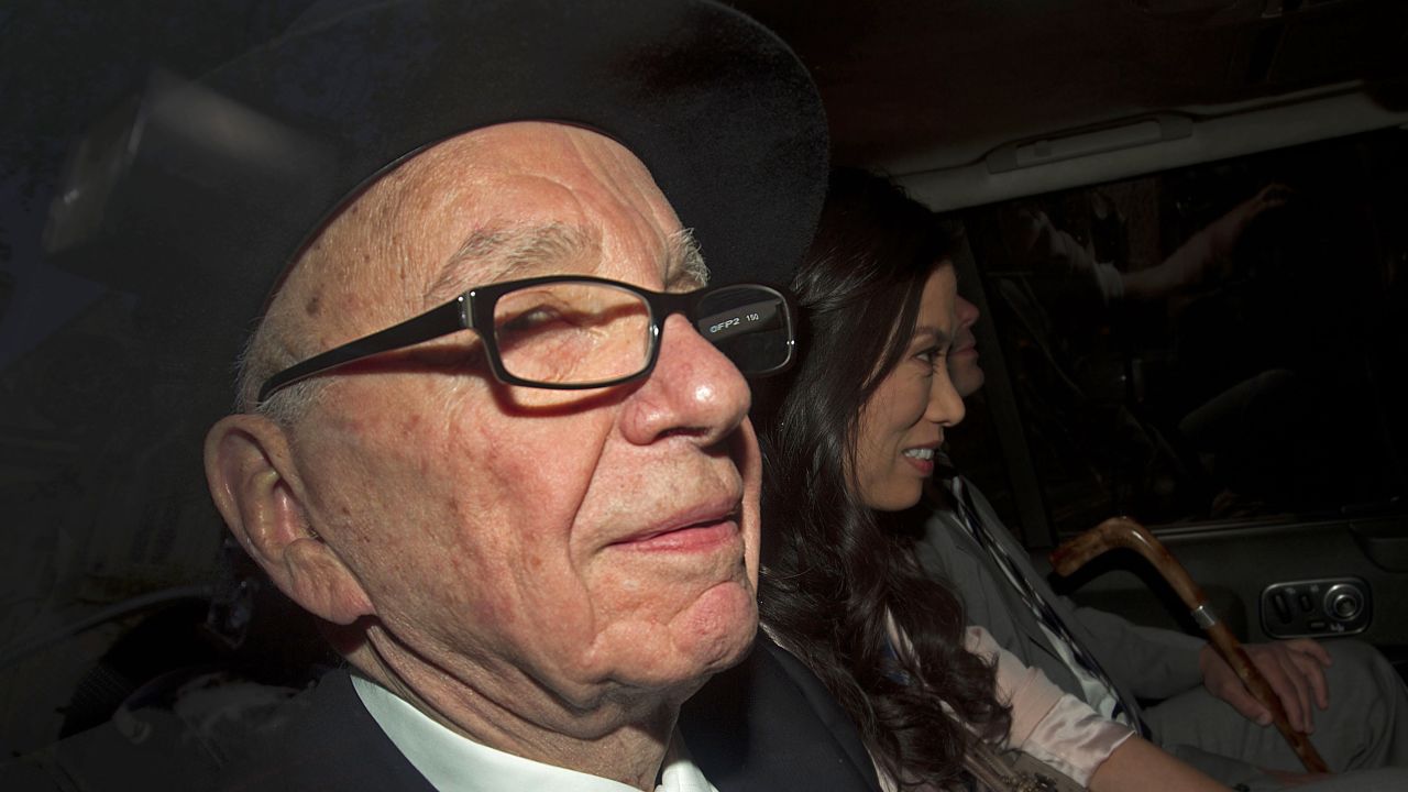 Rupert Murdoch is driven away from the High Court in London after giving evidence at the Leveson Inquiry.