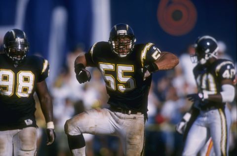 Seau celebrates a defensive stop against the Kansas City Chiefs in 1996.