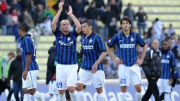 Inter players celebrate at the end of the Italian Serie A football match between Udinese and Inter Milan on April 25, 2012 at Friuli Stadium in Udine. AFP PHOTO / SIMONE FERRARO (Photo credit should read SIMONE FERRARO/AFP/Getty Images) 