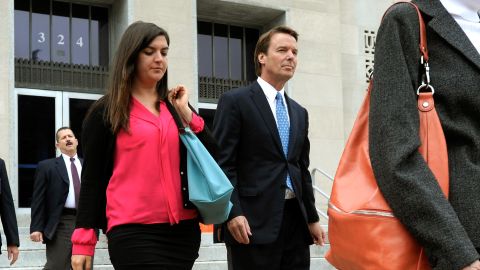 Former U.S. Sen. John Edwards leaves the federal courthouse in Greensboro, North Carolina, with his daughter Cate Edwards on April 23. 