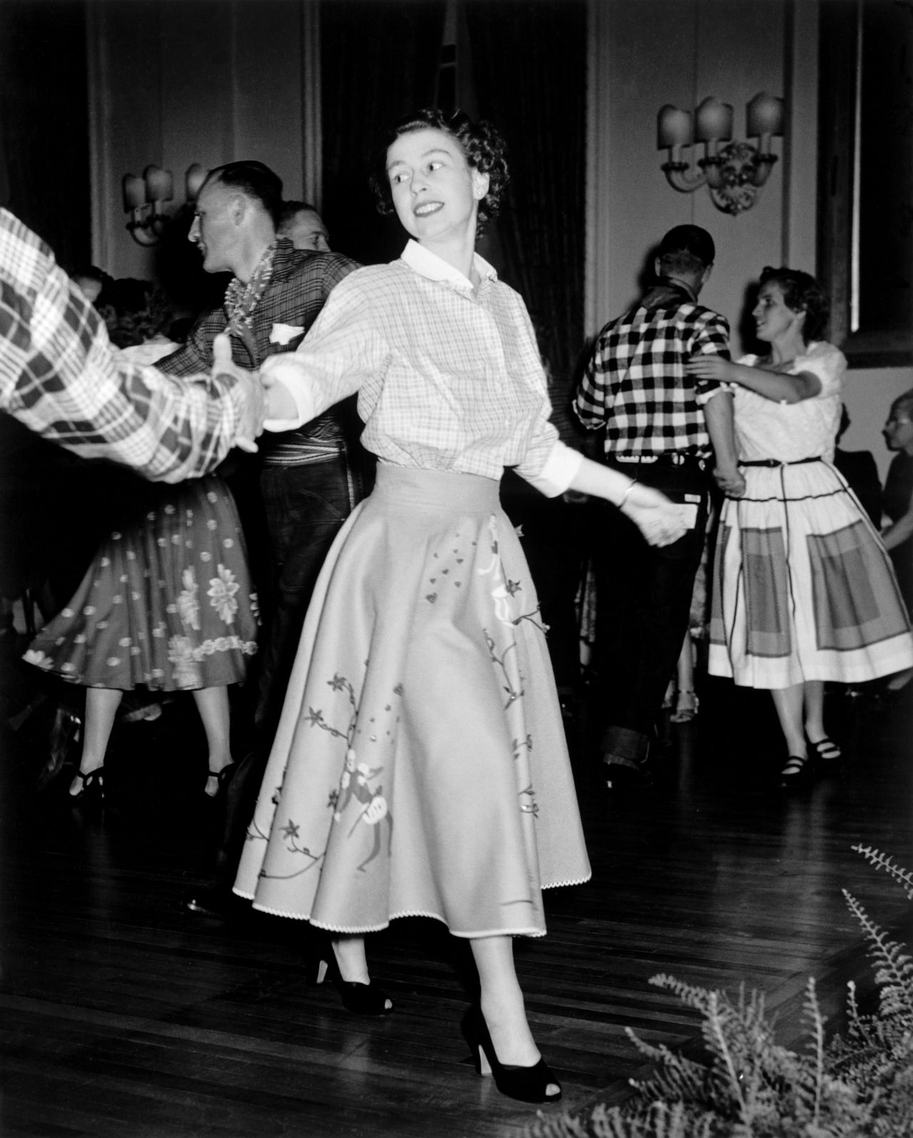 Princess Elizabeth enjoys a square dance held in the honor of the royal couple who were in Canada on a state visit in 1951.