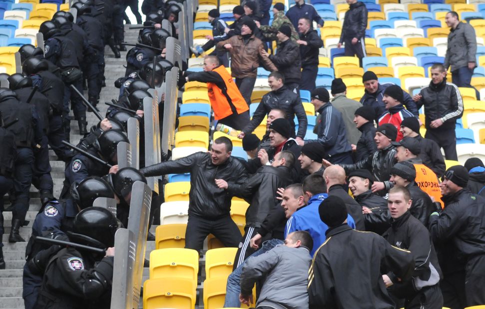 Fears have been raised about visiting supporters' safety after reports highlighting brutality by Ukrainian police and violence by racist fans in both host nations.