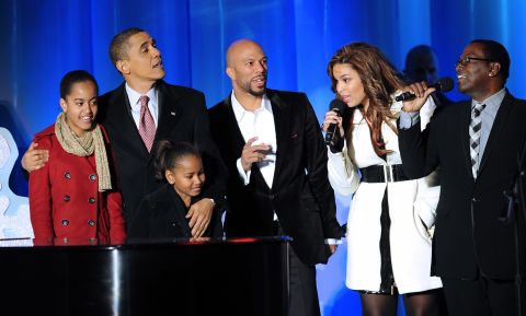 Obama and his daughters, Malia and Sasha, sing with rapper Common, singer Jordan Sparks and "American Idol" judge Randy Jackson during the National Christmas Tree Lighting ceremony on December 3, 2009.