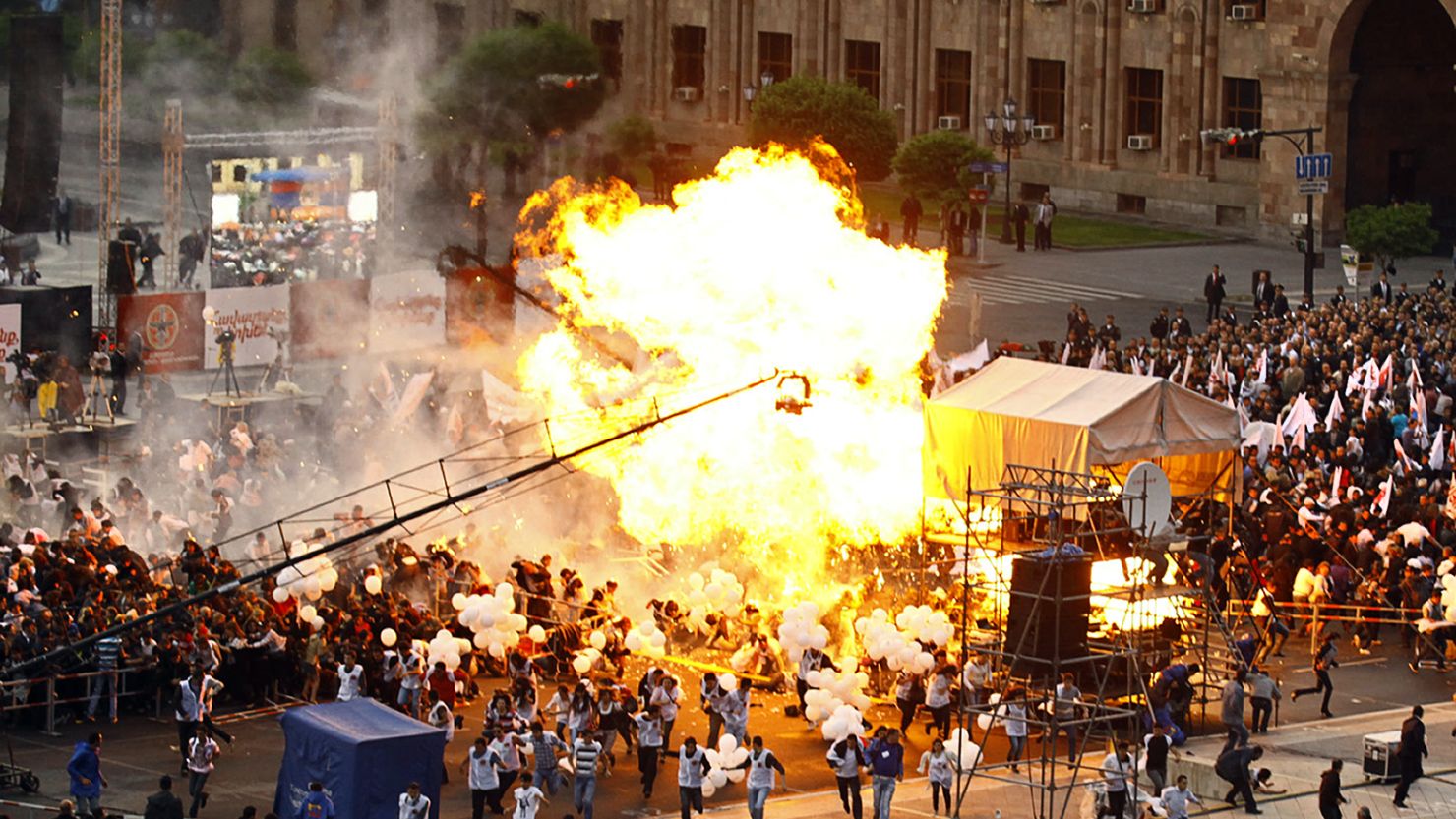 Hydrogen balloons explode during an Armenian Republican party's campaign concert in Yerevan on May 4, 2012. 
