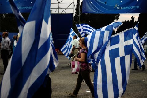 Supporters of Greek conservative party New Democracy gather to listen a speech by the party's leader Antonis Samaras in Athens on May 3, 2012, before the country's first election was held on May 6.
