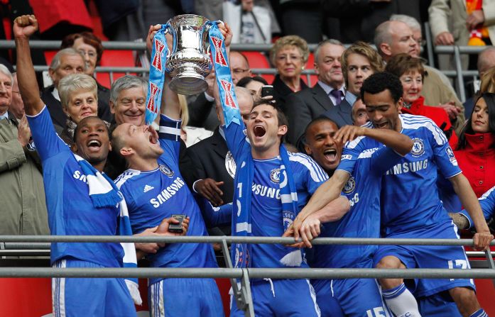 Chelsea's old guard of Didier Drogba (left), captain John Terry (center) and Frank Lampard celebrate Saturday's FA Cup win.