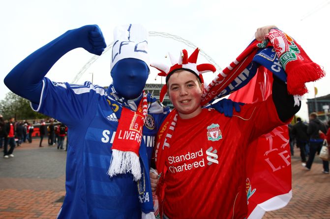 Liverpool and Chelsea fans enjoy the atmosphere prior to the final. A lack of train services due to Monday's public holiday meant that Liverpool fans faced a long trip home after the match.