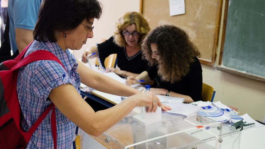 Voters cast their ballots in Greece's general election at a polling station in Athens on Sunday May 6, 2012.