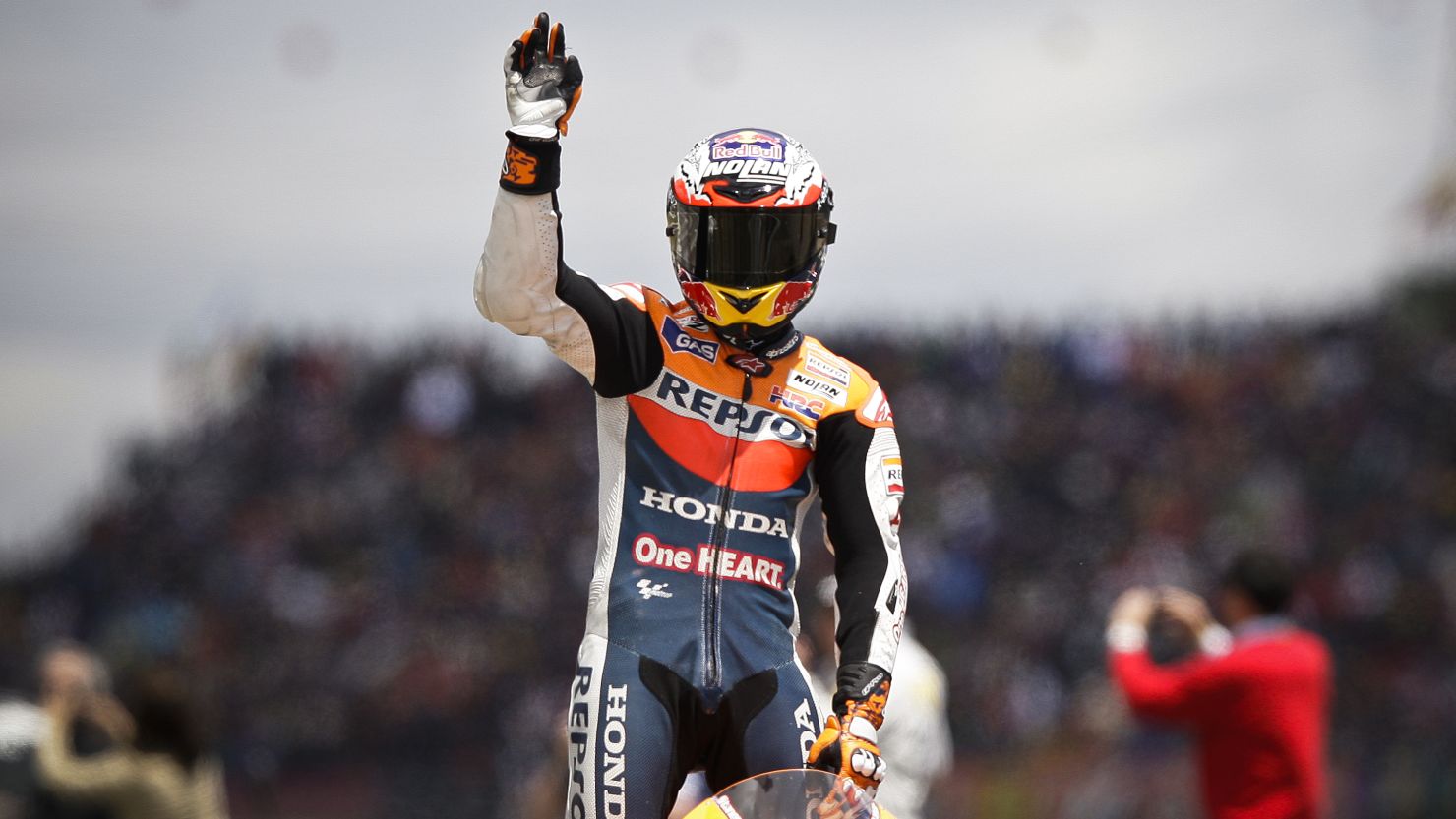 Casey Stoner wins the Portuguese MotoGP, the first time he's won at Estoril
