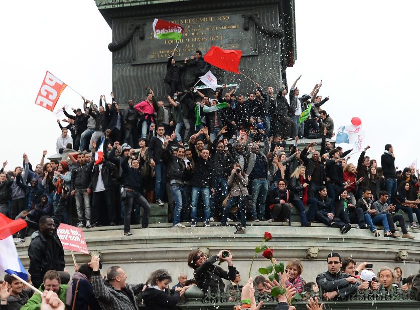 Hollande supporters celebrate his win Sunday at Place de la Bastille in Paris.