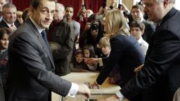 France's incumbent President Nicolas Sarkozy casts his vote in the presidential runoff election on May 6, 2012 in Paris.