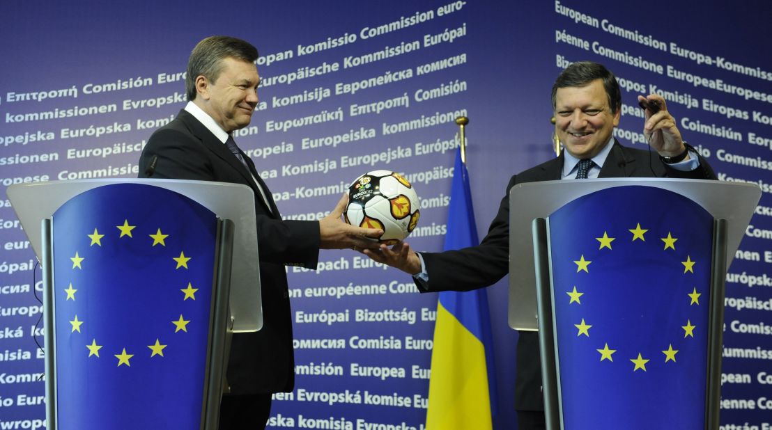 Dozens of European political figures have boycotted the event in protest at Tymoshenko's treatment, including the EU president and head of the EU commission Jose Manuel Barroso. Barroso is pictured here receiving an official Euro 2012 match ball from President Yanukovych just 18 months ago.
