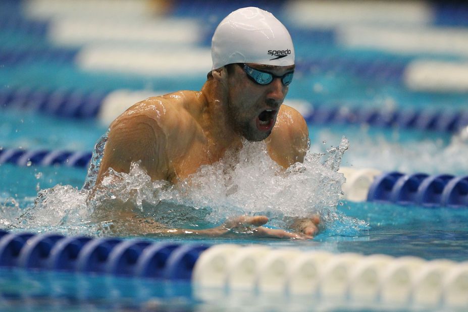 And as swimmers race beneath the sweeping curves of the Aquatics Center, the pressure will be on American Michael Phelps to replicate his success in the last Olympics, when he took home a record-breaking eight golds.