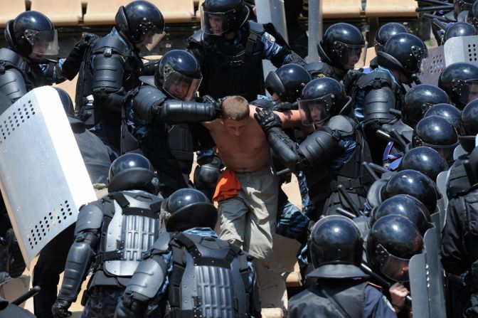 Preparations for Euro 2012 did not run smoothly. The new president promised to allay UEFA's concerns over the slow building work. Here Ukrainian riot police practice ahead of the arrival of tens of thousands of football fans from across Europe. But there are still some worries. Amnesty International issued a warning to fans that Ukraine's police exhibited "criminal" behavior.  