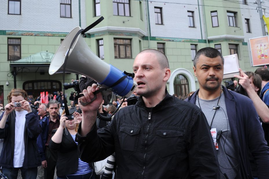 Leftist radical group leader Sergei Udaltsov, center, attends Sunday's rally. He was among the people arrested.