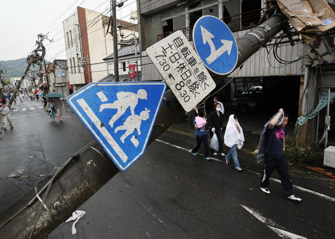 After the winds died down, people wandered out of their homes to survey the damage. Tornados are extremely rare in Japan. The country's Meterological Agency issued an alert for strong winds and rain in a wide area of east and central Japan due to unstable air pressure.