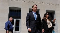 Former Sen. John Edwards and his daughter, Cate, leave the federal courthouse in Greensboro, North Carolina, on April 12.