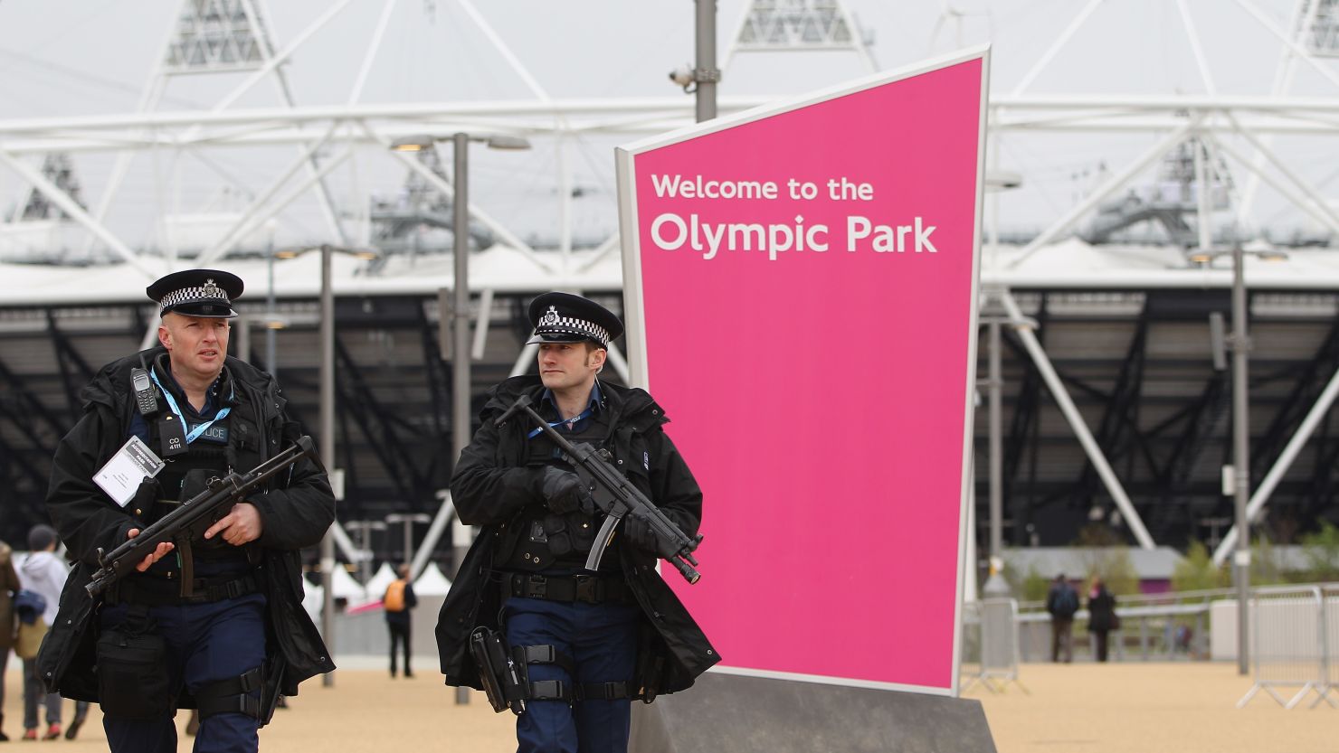 Armed police officers patrol Olympic Park during a test event at London's Olympic Stadium in London on May 5.
