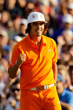 Rickie Fowler, one of golf's most colorful characters, celebrates his first PGA Tour title at Quail Hollow, where he won in a playoff against 2010 champion Rory McIlroy and D.A. Points. 