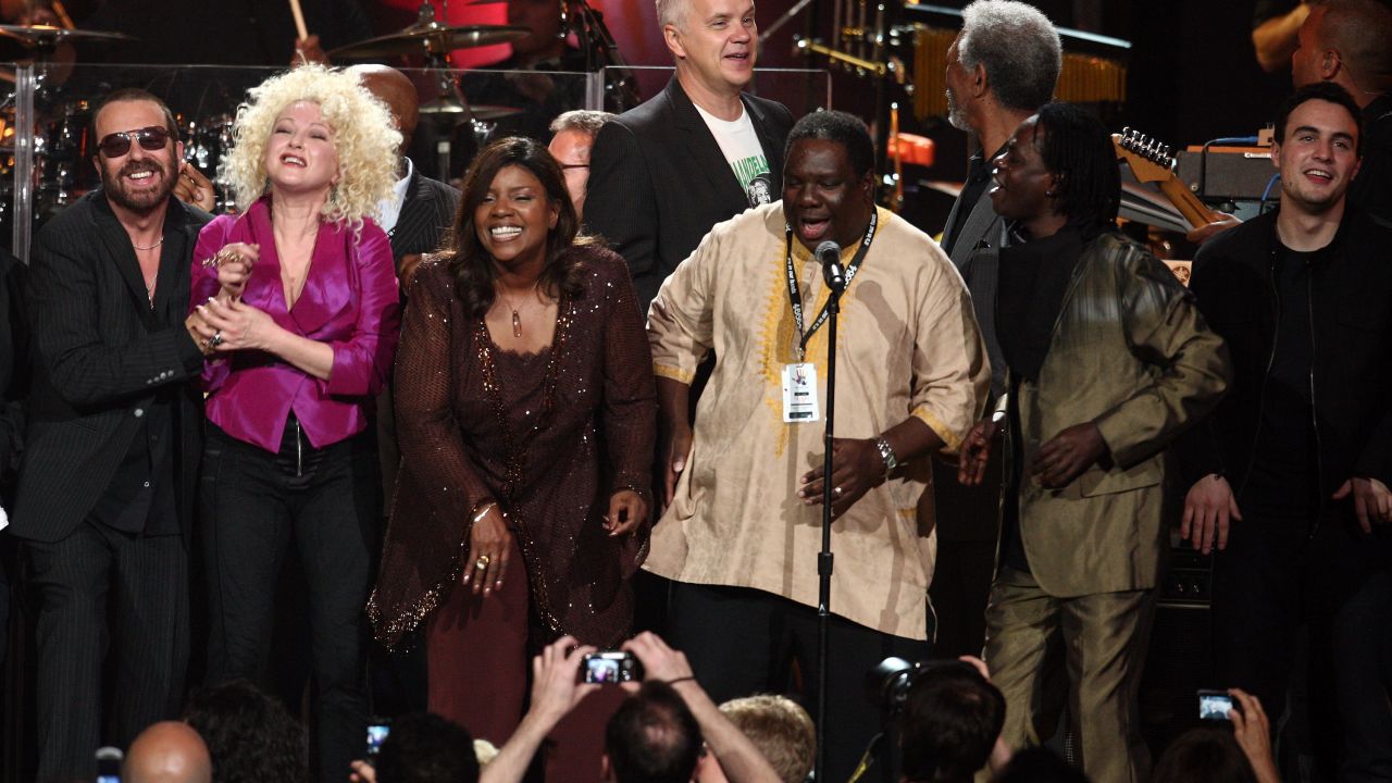 With Dave Stewart, Cyndi Lauper, Angelique Kidjo, Tim Robbins, Morgan Freeman, Baaba Maal and Jesse Clegg during the Mandela Day concert.