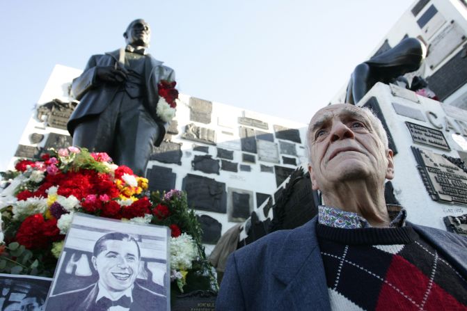 Monuments to legendary tango singer and composer Carlos Gardel are scattered around the former fruit and vegetable market area of Abasto, in the Balvanera neighborhood. Here, fans of Gardel leave flowers at his grave at a rally in June 2010 to commemorate the 75th anniversary of his death.