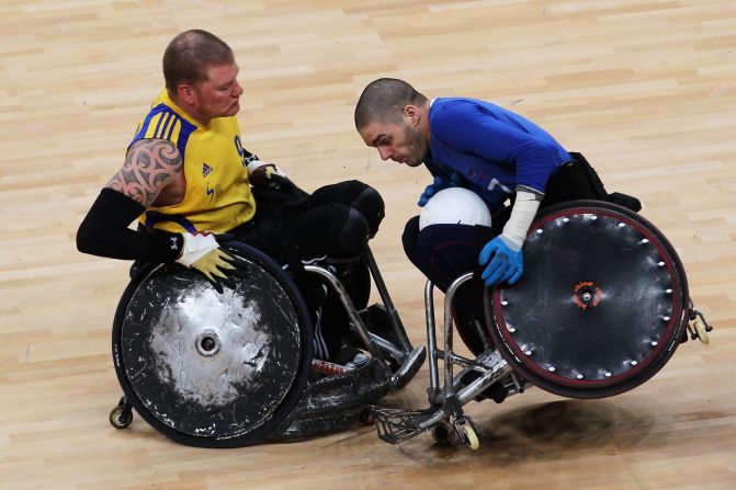 Sweden's Per-Johan Uhlmann (left) battles with Britain's Aaron Phipps during a London 2012 test event on April 18. 