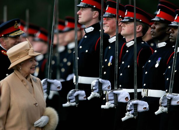 Since the death of Diana, the queen's popularity has enjoyed a revival as she continues to preside over what appears to be a softer, more accessible modern royal family. Here, she attends her grandson Prince Harry's graduation from the Royal Military Academy at Sandhurst, southern England in 2006.