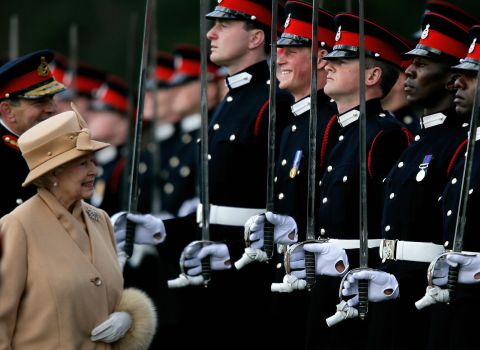Since the death of Diana, the queen's popularity has enjoyed a revival as she continues to preside over what appears to be a softer, more accessible modern royal family. Here, she attends her grandson Prince Harry's graduation from the Royal Military Academy at Sandhurst, southern England in 2006. 