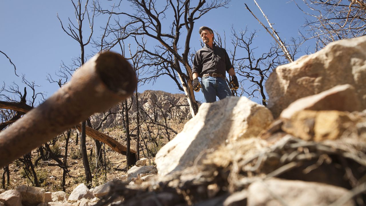 Kevin Rudd surveys broken pipe at one of Tombstone's springs above Sierra Vista, Arizona.