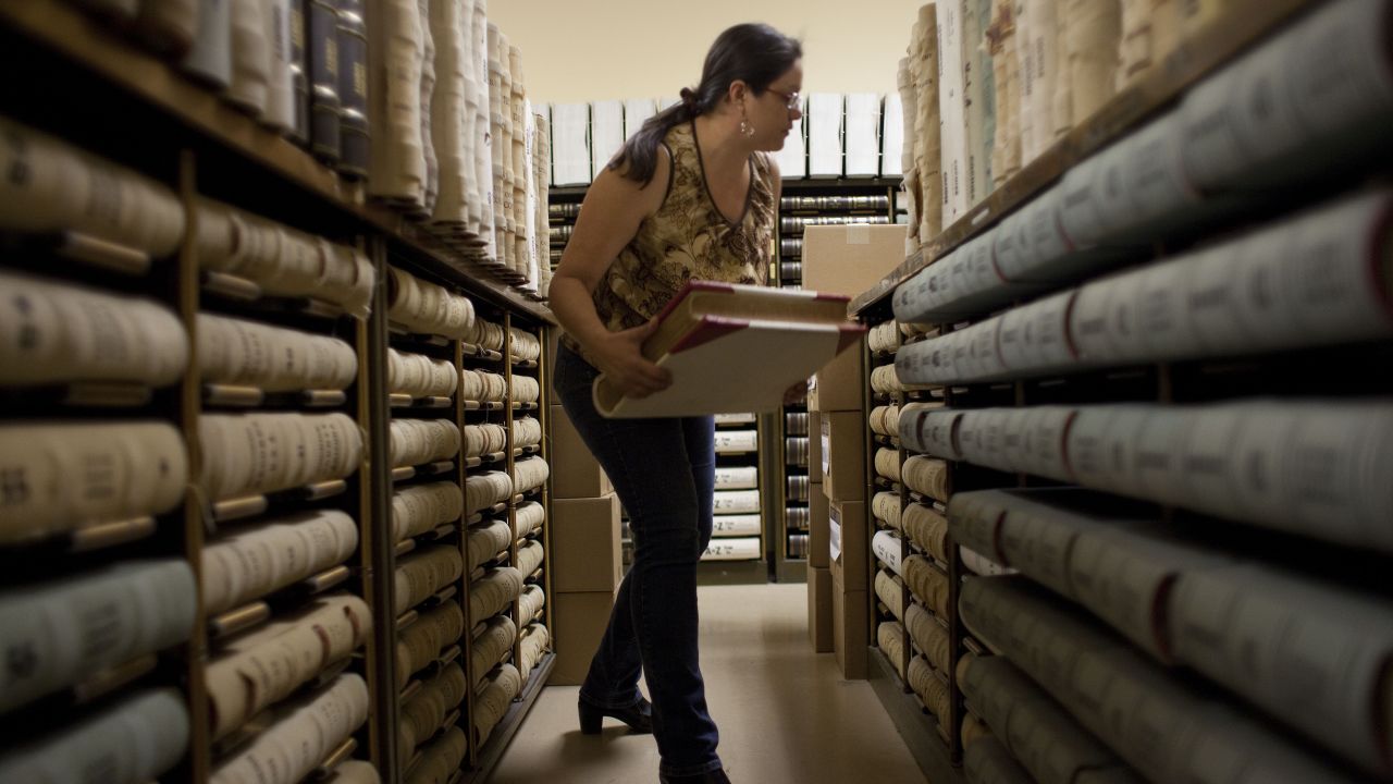 Tombstone archivist Nancy Sosa searches for documents at the Cochise County Recorder's Office.