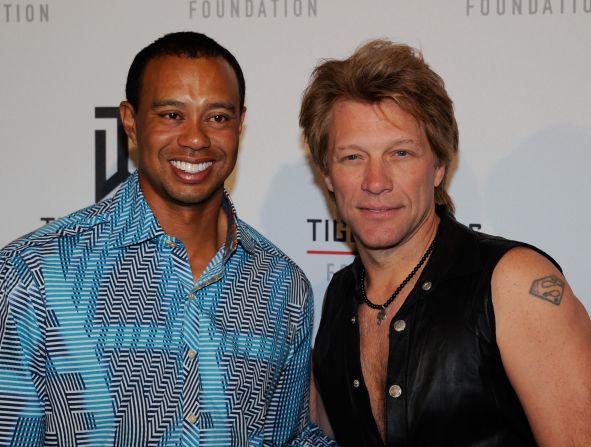 Woods with rock star Jon Bon Jovi, who performed at Tiger Jam 2012 on  April 28. The event raised almost $1 million for Woods' charity foundation.
