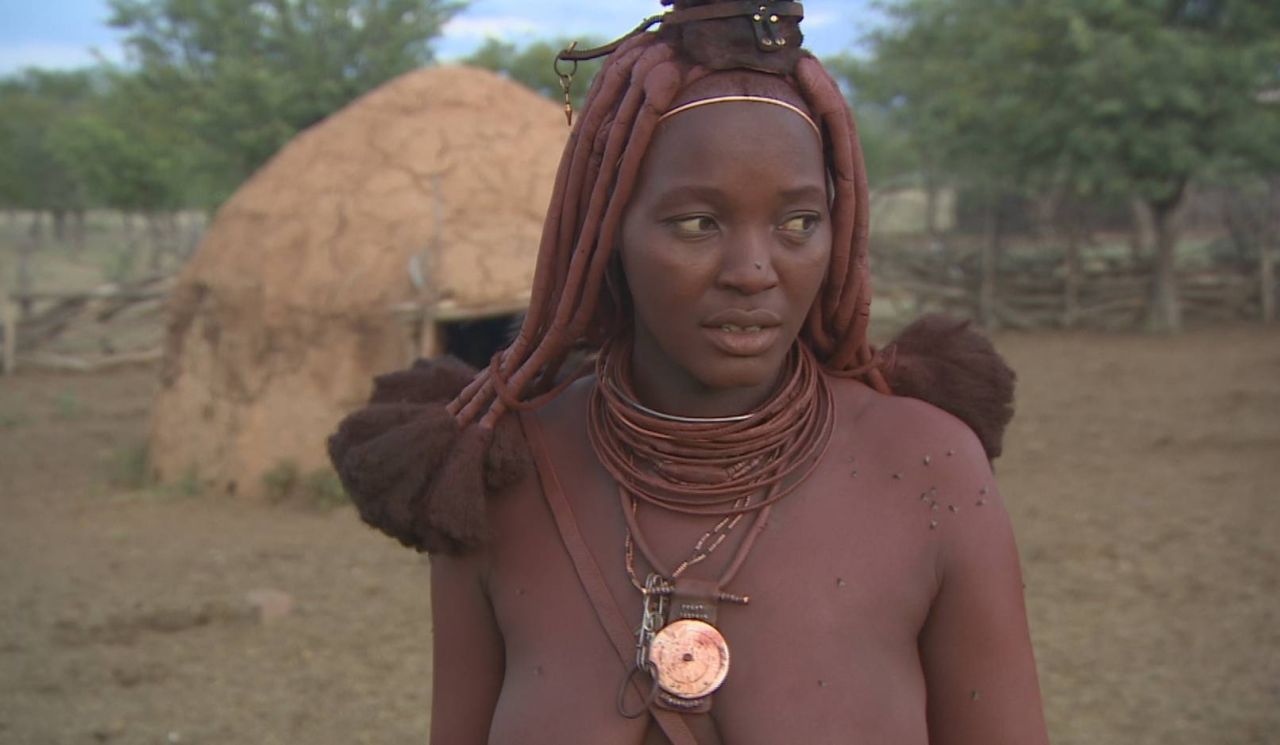 <em>Otjize</em> sometimes contains aromatic resin from a local shrub to provide an appealing fragrance. It is applied by Himba women every morning, but never by men.