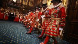 Yeomen of the Guard pick up oil lanterns as they prepare to conduct a ceremonial search in the Palace of Westminster.